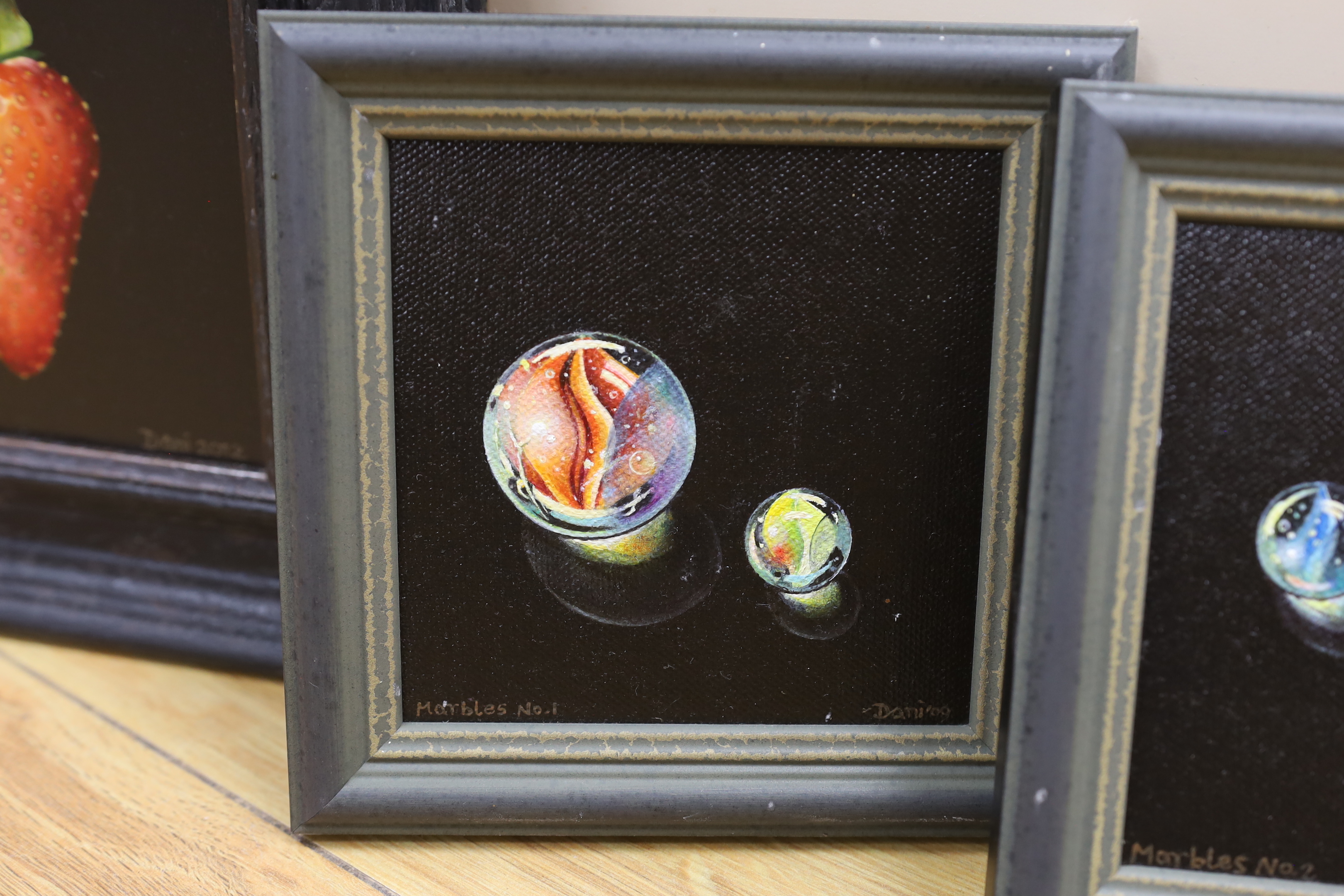 Dani Humberstone (contemporary) three oils on canvas board, Still lifes, 'Big red strawberry', 'Marbles No1' and 'Marbles No2', each signed and dated, largest 12 x 11cm